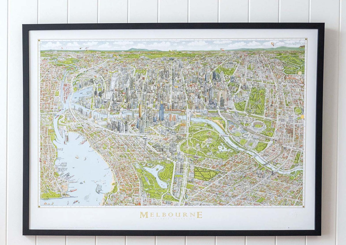 Close-up of the large version of The Melbourne Map colour open edition art print in a black frame hung on a white panelled wall in a bright airy room